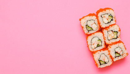 Japanese rolls on colorful background.