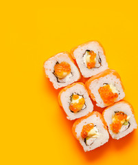 Japanese rolls on colorful background.