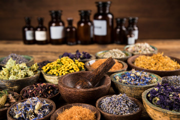 Natural remedy,Herbal medicine and wooden table background