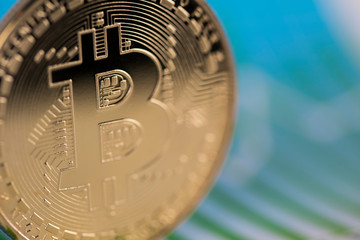 Golden Bitcoin Coin, virtual money, financial chart