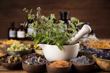 Natural remedy,Herbal medicine and wooden table background