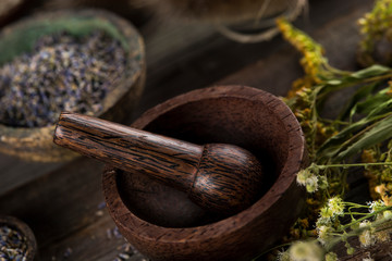Herbs medicine and vintage wooden background