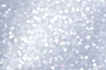 Fototapeta na wymiar sparkles of silver glitter texture background