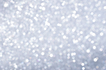 sparkles of silver glitter texture background