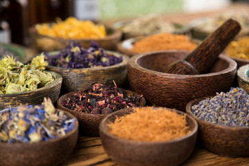 Herbs medicine and vintage wooden background