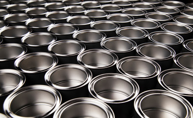 Group of tin metal cans with color paint