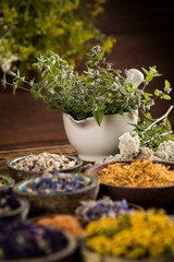 Natural remedy,Herbal medicine and wooden table background