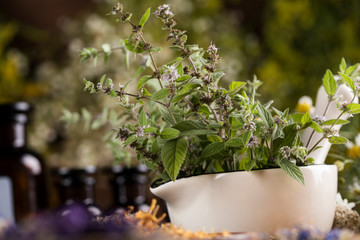 Natural remedy,Herbal medicine and wooden table background