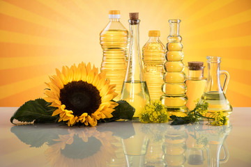 Bottles of sunflower oil with flower
