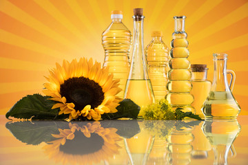 Bottles of sunflower oil with flower
