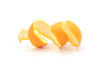 Slice of curly fresh orange peel closeup isolated on white background