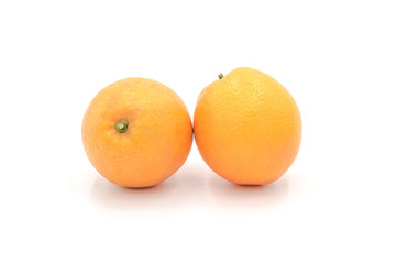 2 fresh whole oranges isolated on white background