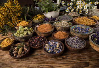Natural remedy,Herbal medicine and wooden table background