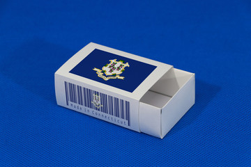 Connecticut flag on white box with barcode and the color of state flag on blue background, paper packaging for put match or products. The concept of export trading.