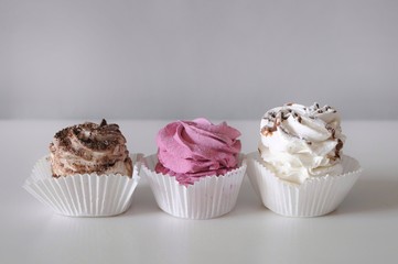 Homemade marshmallow berry zephyr on white background