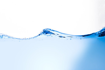 Blue water waves and bubbles isolated on a white background.