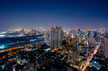 Cityscape night view of Bangkok modern City business building and high skyscraper at Bangkok,Thailand.