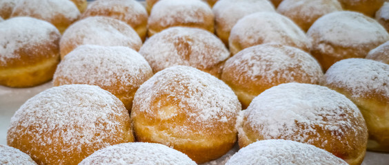 Festive donuts are traditional symbols of Hanukkah Holiday