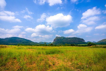 beautiful blue sky green forest mountains lake view at Kaeng Krachan National Park, Thailand.  an idea for backpacker hiking on long weekend or a couple, family holiday activity camping relaxing