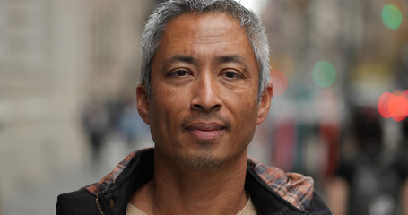 Middle aged man in city face portrait