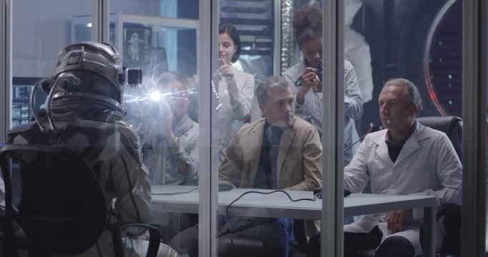 Astronauts talking with journalists before departure