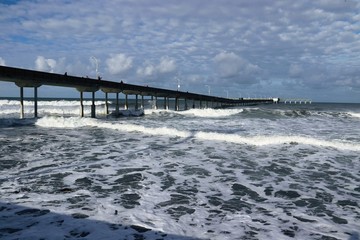 Obraz premium high Tide At Ocean Beach Pier