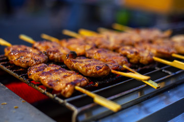 Roast pork that is cooked on the stove has a sweet and delicious flavor, eaten with sticky rice, is a popular snack in Thailand