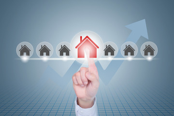 Business people click on the house icon on the virtual screen, the concept of character property creative map