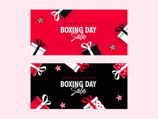 Boxing Day Sale banner design decorated with gift boxes and stars in two color option.