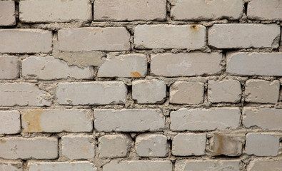 Old white brick wall as abstract background