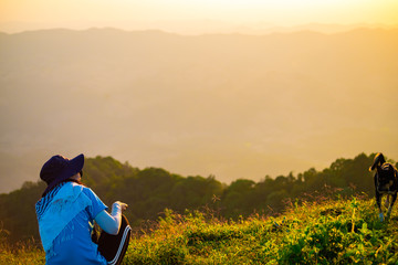 photographer taking pictures in mountains