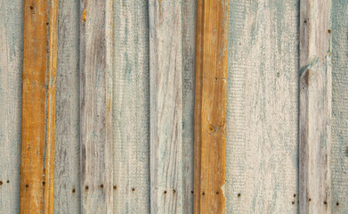 Old wooden boards on the fence as a background