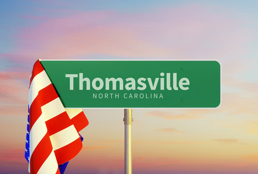 Thomasville &ndash; North Carolina. Road or Town Sign. Flag of the united states. Sunset oder Sunrise Sky. 3d rendering
