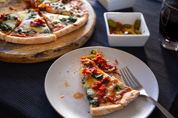 Homemade spinach pizza with mozzarella