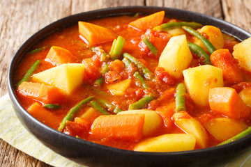 Yataklete Kilkil Spiced Vegetables Ethiopian recipe closeup on a plate. horizontal