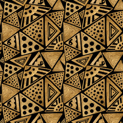 Ethnic gold hand painted seamless pattern. Abstract triangles golden background. Tribal aztec texture.