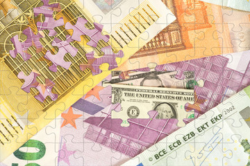 Puzzle aus Euro und Dollar Banknoten