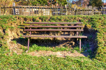 Romantic bench in a nature park in spring.