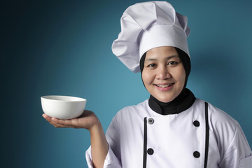 Asian Female Chef Shows Empty White Bowl, Presenting Something, Copy Space