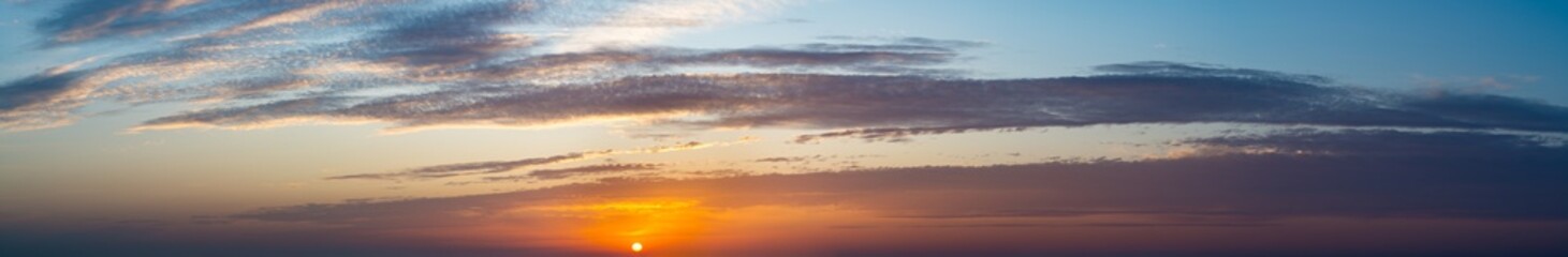 Fototapeta na wymiar Fantastic clouds at sunrise