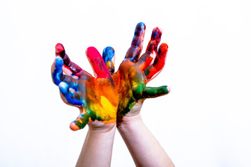 On a white background, children's hands in paint. © Виктория Сорокинпа
