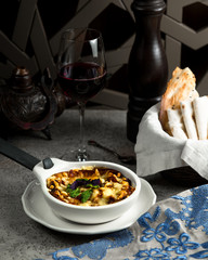 fried julien with mushrooms and cheese