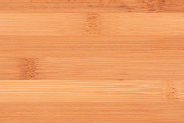 Naklejka premium Wooden cutting board close up texture background.