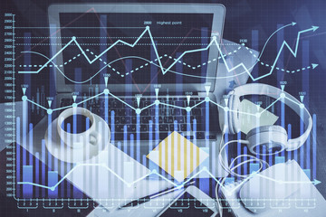 Double exposure of forex chart and work space with computer. Concept of international online trading.