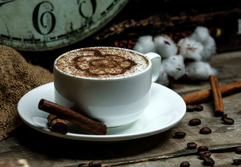 hot cappuccino glass with cinnamon pattern