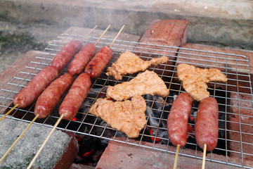 Closeup grilled meat, taiwanese cuisine on white background