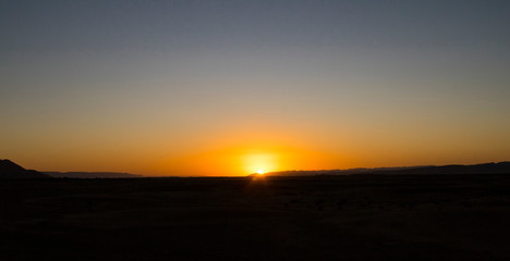 Sunset in the desert of Zahora (Morocco)