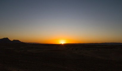 Sunset in the desert of Zahora (Morocco)