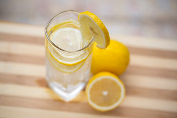 1 cup lemon water and cut lemon on the table