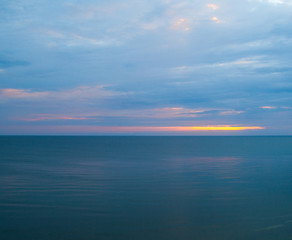 Calm sea in a cloudy morning